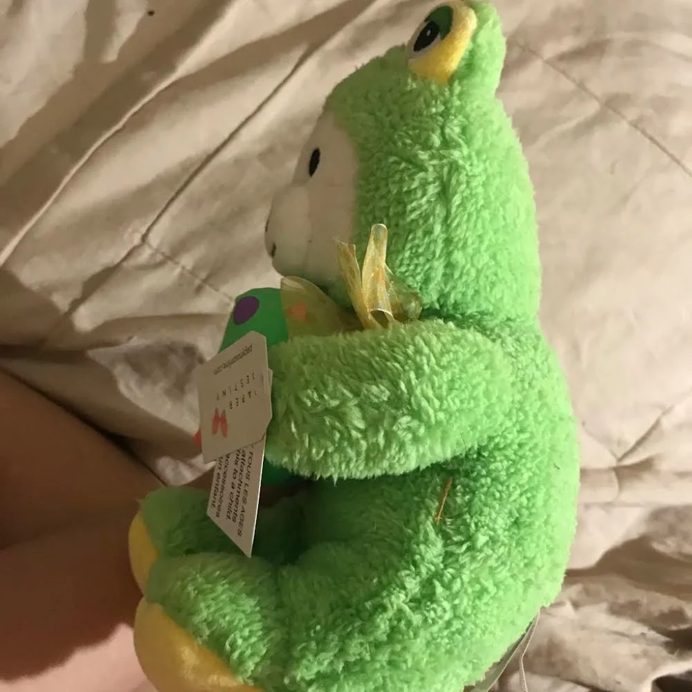 Easter bear in a frog costume holding egg - Picture 2 of 2